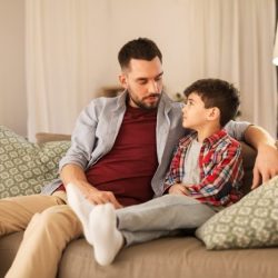 A father and his son are celebrating the father's 75th